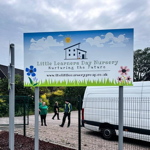 An image of the nursery's post and panel signs.